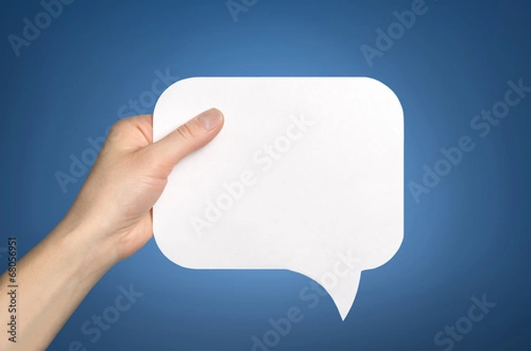 Fototapeta Hand holding an empty speech bubble