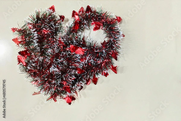 Fototapeta green and red decorations for christmas celebration forming love on white copy space background