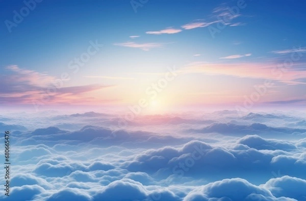 Fototapeta  the sun is setting over the clouds in the sky as seen from the top of a plane in the sky.