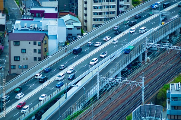 Fototapeta A traffic jam on the highway in Osaka by high angle view telephoto shot