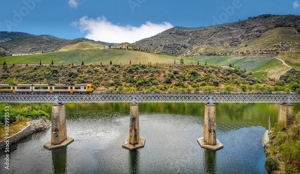 Fototapeta Train over bridge in Tua