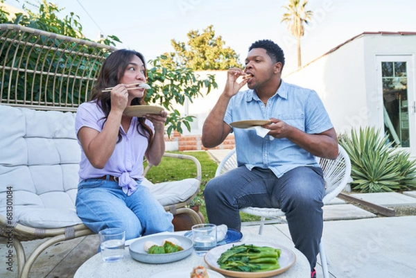 Obraz People eating dim sum on patio