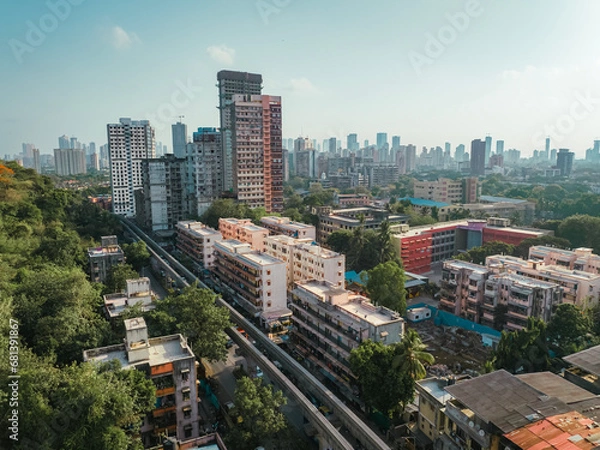 Fototapeta Aerial view of Mumbai city, Maharashtra, India. Beautiful weather in Mumbai during the monsoon. Mumbai skyline, Modern City high-rise skyscraper buildings.