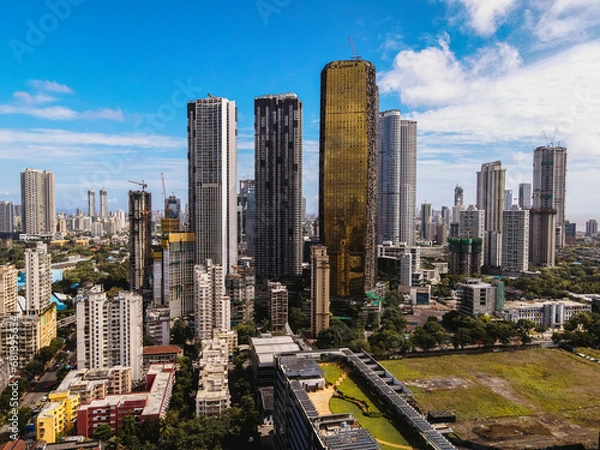 Fototapeta Modern City high-rise skyscraper buildings. Aerial drone view of the Financial District in Mumbai. Daytime Mumbai City, India
