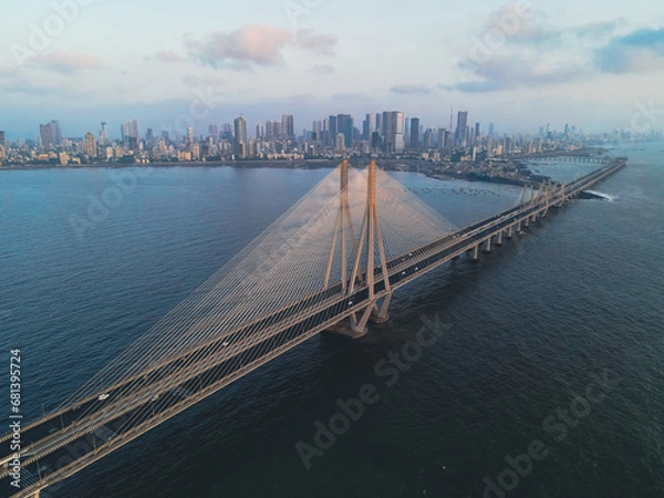 Fototapeta Aerial view of vehicles Passing over Bandra Worli Sea Link in Mumbai, India. Weather in Mumbai, Morning skyline Mumbai. Developing India concept. Longest Bridge in India.