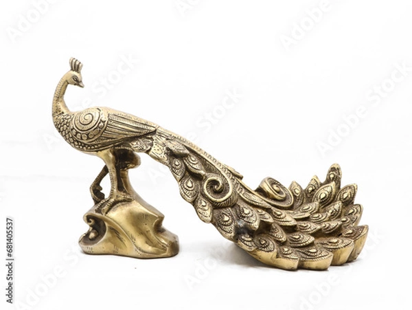 Fototapeta golden male peacock figurine with stand handcrafted and decorated with ornate details isolated in a white background