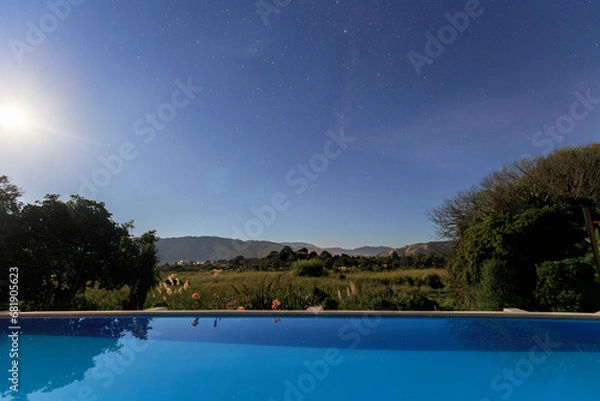 Obraz Poolside Paradise with Celestial Reflections