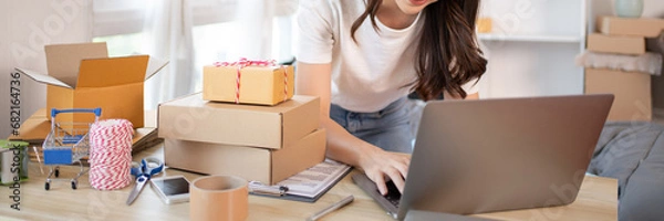 Fototapeta Empowering SMEs: Online Selling and Shipping for Small Business Owners, E-Commerce and Digital Commerce Concept.