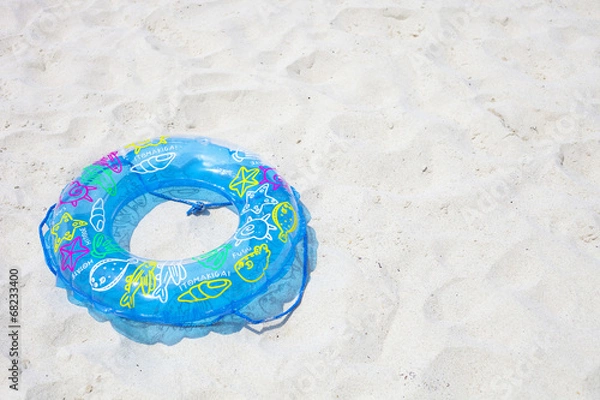 Fototapeta 砂浜の浮き輪