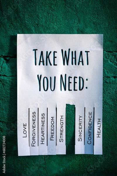 Fototapeta Tear-off stub note with text 'Take what you need' on emerald background. One wish is torn off.