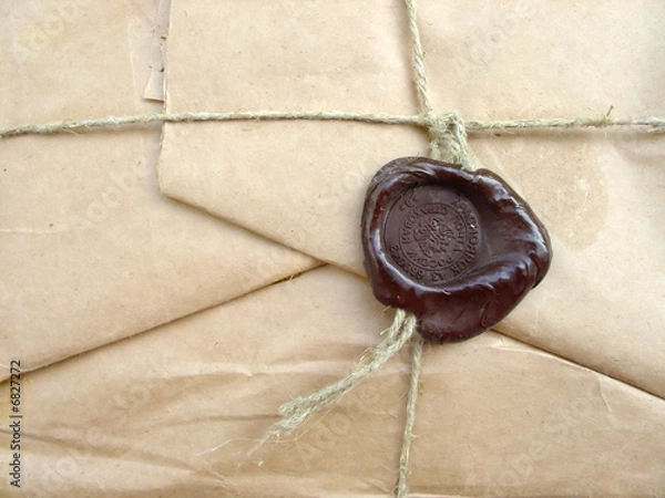 Fototapeta brown packet with sealing wax