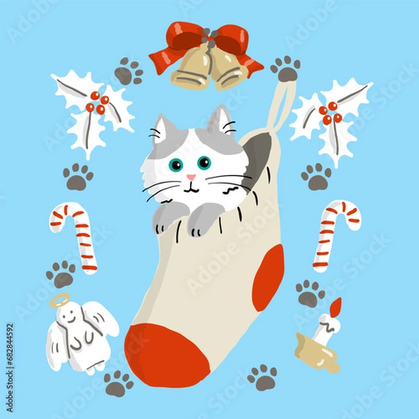 Fototapeta クリスマスの靴下に入った子猫とクリスマスの飾り