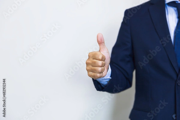 Obraz ビジネスマンがサムズアップでいいねBusinessman  thumbs up. like it well done