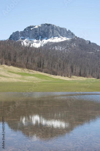 Obraz Mountain landscape against clear blue sky