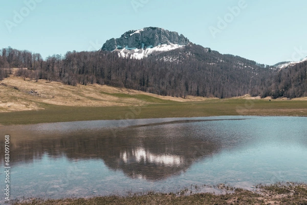 Obraz Mountain landscape against clear blue sky