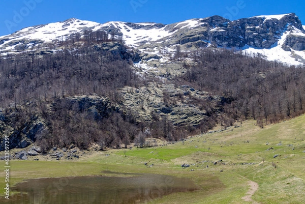 Obraz Mountain landscape against clear blue sky