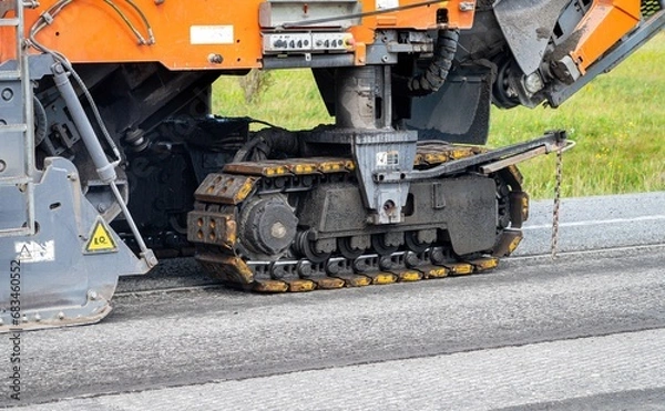 Fototapeta Close-up view of a track of an asphalt planer on a road