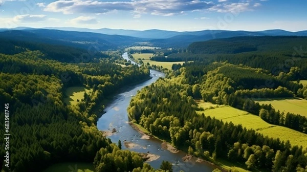 Fototapeta a river running through a valley