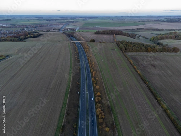 Obraz Highway Leading to Tunnel Surrounded by Fields, View from 120 Meters