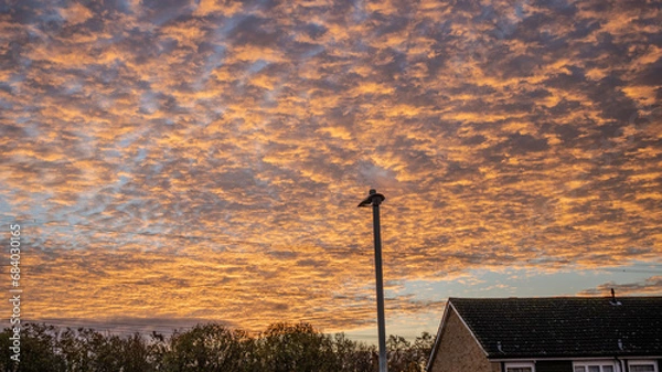 Obraz Morning Sky in Shades of Orange with Gently Rippled Clouds