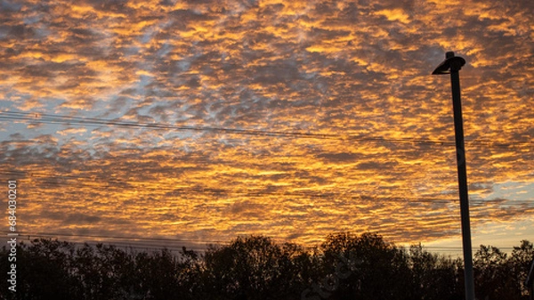 Obraz Morning Sky in Shades of Orange with Gently Rippled Clouds