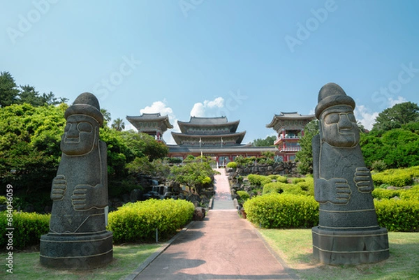 Fototapeta Yakcheonsa Temple and Dol hareubang in Jeju Island, Korea