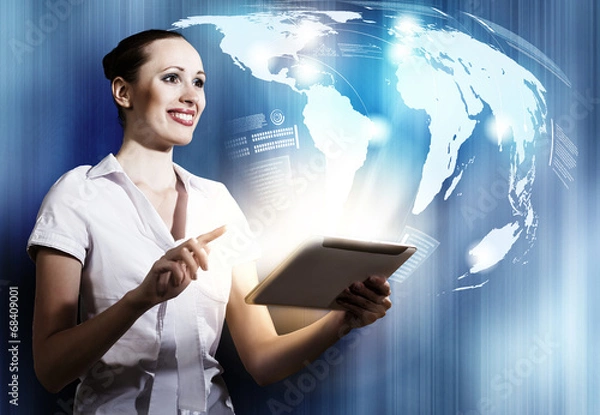 Fototapeta Woman using tablet pc