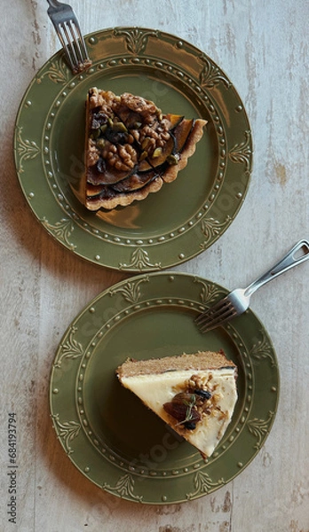 Obraz Pumpkin pie and carrot cake on vintage plate served with mulled wine on wooden rustic table, Christmas atmosphere