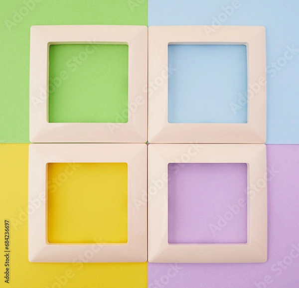 Obraz four empty frames on a colorful background