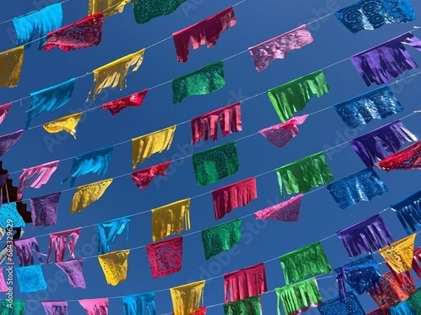 Obraz Colorful Papel Picado flags/banners hanging in the streets of Oaxaca, Mexico