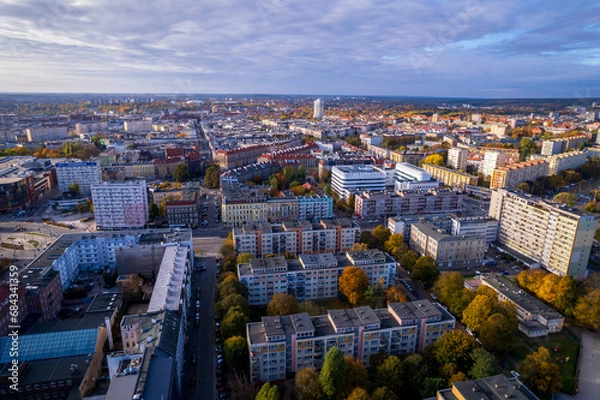 Fototapeta Szczecin from a bird's eye view on a sunny day. View of the city from the Oder River. City buildings, the seaport in Szczecin and its most characteristic places.