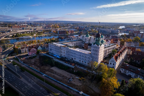 Fototapeta Szczecin from a bird's eye view on a sunny day. View of the city from the Oder River. City buildings, the seaport in Szczecin and its most characteristic places.