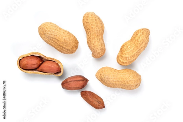 Fototapeta Peanuts isolated on white background. Top view