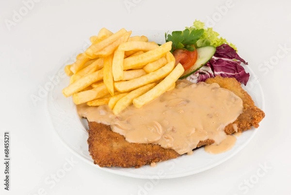 Obraz Jägerschnitzel mit Pommes und Soße