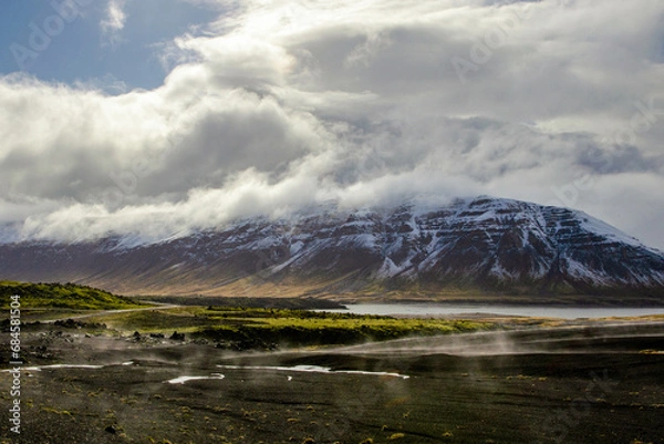 Fototapeta Mystic Icelandic lava fields under the clouds