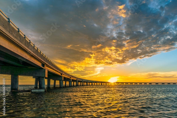 Fototapeta The Rodanthe Bridge is designed to be a sustainable solution to protect against storms. It is located at the northern end of the Pea Island National Wildlife Refuge in North Carolina.