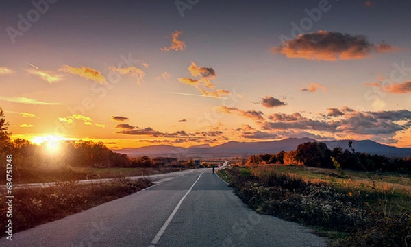 Fototapeta sunset over the road
