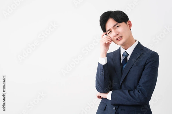 Fototapeta ビジネススーツを着ている若い男性　ビジネスイメージ