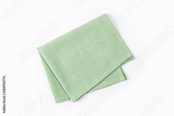 Fototapeta Top view of Light green kitchen napkins isolated on white background. 