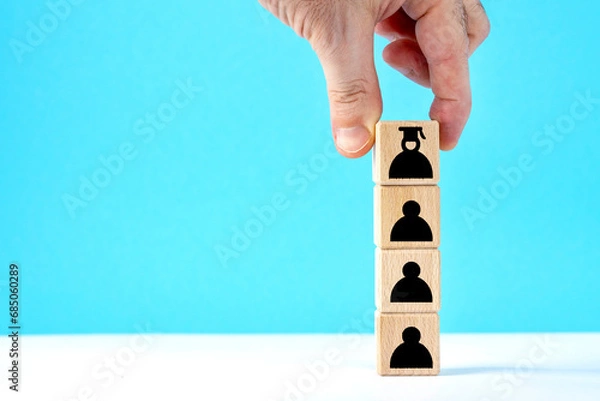 Fototapeta Wooden cubes with student icons