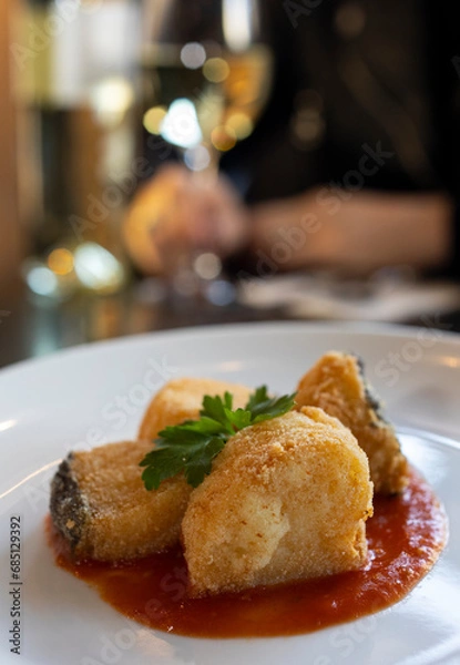 Obraz fried cod served in a restaurant
