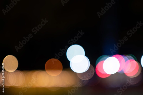 Fototapeta bokeh background on dark background.