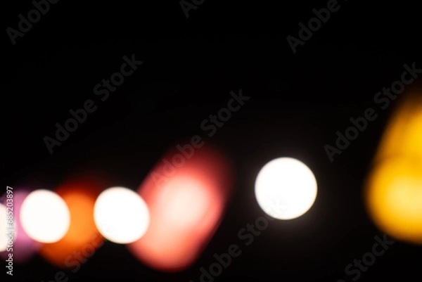 Fototapeta bokeh background on dark background.