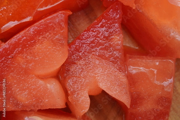 Fototapeta Tomato cuts , close up view