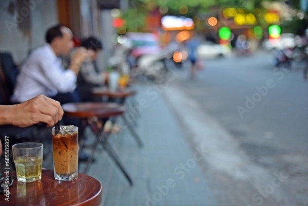 Obraz Close up of Vietnam milk iced coffee, street and daily drinks of people
