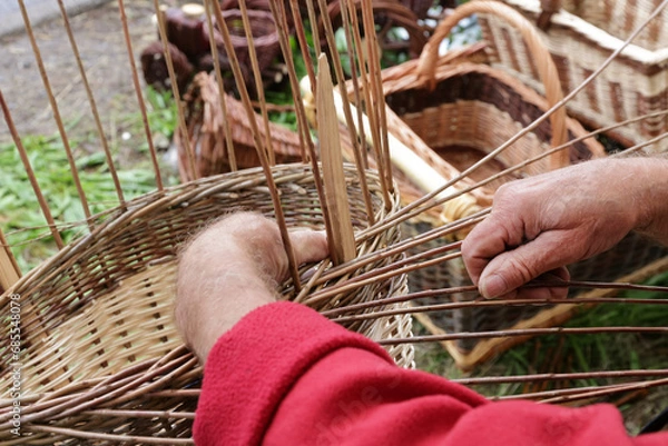 Fototapeta Basket maker at work