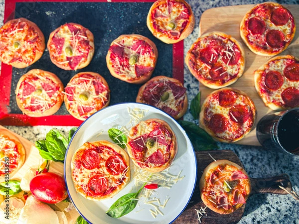 Obraz Small pepperoni pizza in a party table