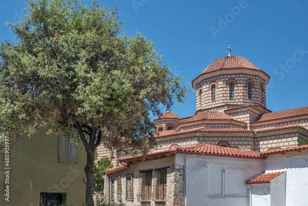 Fototapeta Typical Street and building at town of Arta, Greece