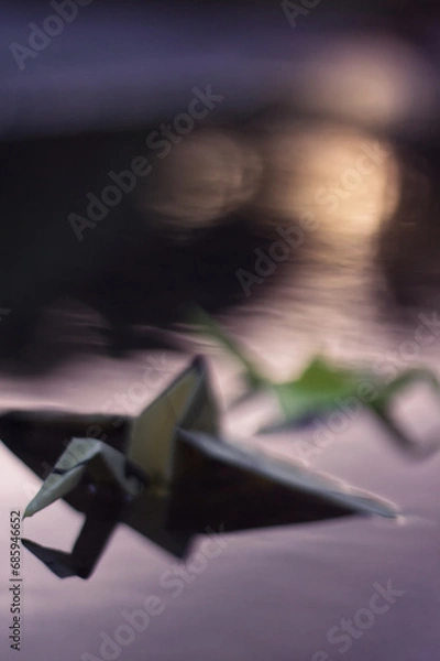 Obraz Origami bird in water at sunset