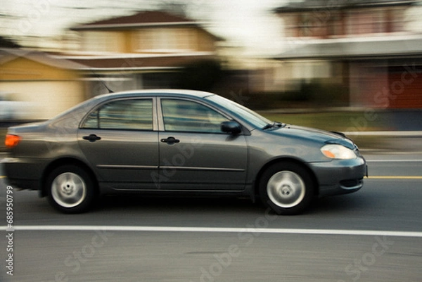 Obraz Speeding vehicle on the street